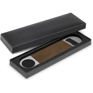 A drink bottle opener with a silver metal finish and a brown leather grip, presented in a black box.