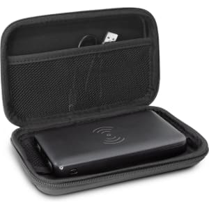 A black wireless charging power bank inside a zippered case, featuring a mesh pocket for accessories.