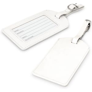 Aero Luggage Tag in white, featuring a clear identification panel and a metal attachment clip.