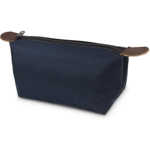 A navy toiletry bag with a zip closure and brown leather accents. It has a simple, clean design.