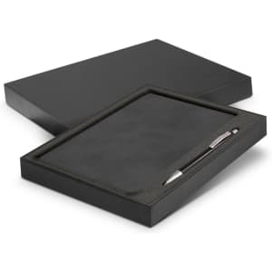 A black gift box containing a black notebook and silver pen, featuring a textured interior.