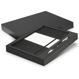 A black gift box containing a dark grey notebook and a silver pen. The notebook includes a section for notes.