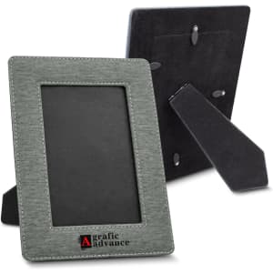 A green photo frame with a textured finish and a stand, featuring a logo on the front.