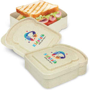 A cream-coloured sandwich box with a sandwich and fillings inside, featuring a logo on the lid.