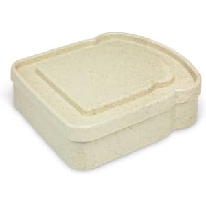 A light beige sandwich box with a textured surface, featuring a rounded lid and a compact design.
