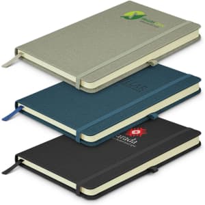 Three notebooks in green, teal, and black with elastic closures and contrasting coloured pages. Each features a logo.