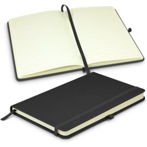 A black notebook with a textured cover, featuring lined pages and an elastic closure, opened to reveal its interior.