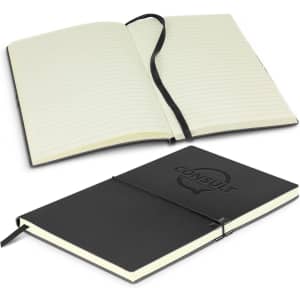 A black Samson Notebook with a textured cover, featuring lined pages and a black ribbon bookmark.