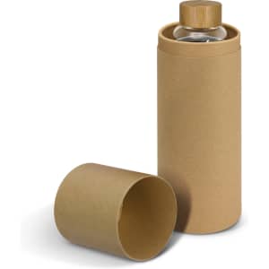 A drink bottle in a cylindrical cardboard container, featuring a bamboo lid and a clear glass body.
