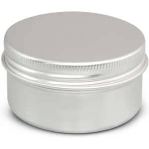 A silver citronella candle in a round metal tin with a smooth lid. The design is simple and sleek.