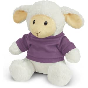 A plush toy lamb with cream fur and a purple shirt, featuring soft ears and a friendly expression.