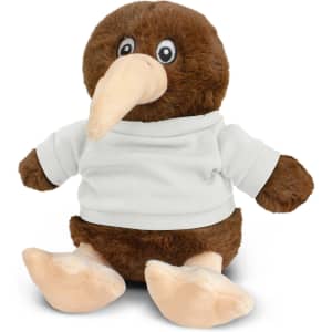 A brown Kiwi plush toy with a beige beak and feet, wearing a white T-shirt. It has a logo on the shirt.