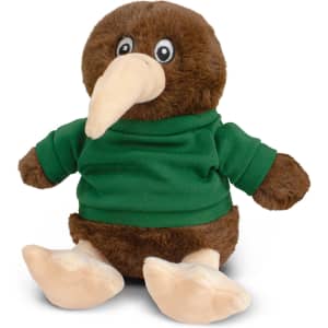 A brown kiwi plush toy wearing a green shirt, with large feet and expressive eyes. Features a logo on the shirt.