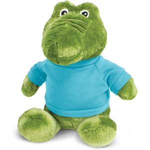 A green crocodile plush toy wearing a blue shirt, featuring large eyes and a soft texture.