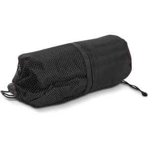 A black mesh and fabric pouch, compactly rolled, suitable for storing a poncho.