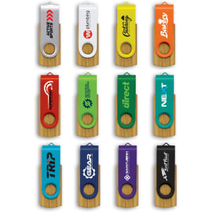 A collection of Helix 4GB bamboo flash drives in various colours, featuring different logos and branding.