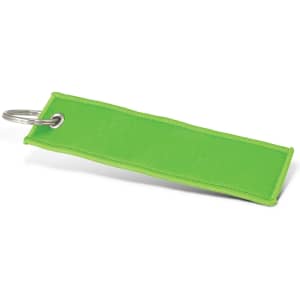 A green woven key ring featuring a metal ring for attachment. It has a simple, flat design.
