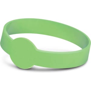 A green silicone wristband with a circular detail, designed to glow in the dark. It features a logo.