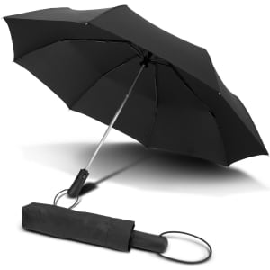 A black compact umbrella with a silver handle, displayed open with a matching cover beside it.
