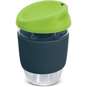 A drink bottle made from borosilicate glass, featuring a green silicone lid and navy blue sleeve.