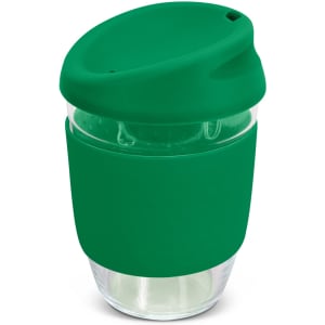 A drink bottle featuring a green silicone lid and sleeve, with a clear borosilicate glass body.