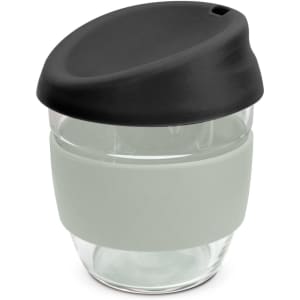 A drink bottle made of clear borosilicate glass with a black lid and grey silicone sleeve. Features a logo.