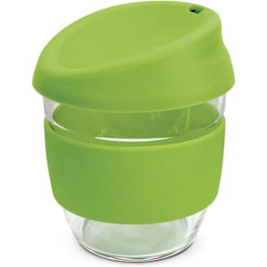 A drink bottle made of clear borosilicate glass with a bright green silicone lid and sleeve.