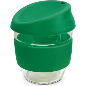 A drink bottle with a transparent borosilicate glass body, featuring a green silicone lid and sleeve.