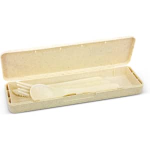 A cream cutlery set in a case, featuring a knife, fork, spoon, and a lid with a textured design.