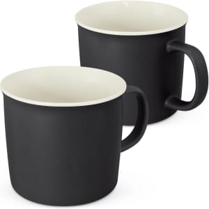 A drinkware set featuring two black coffee mugs with a contrasting white interior and a handle. Each mug has a smooth finish.