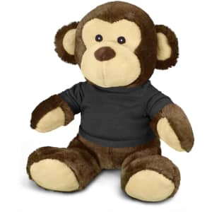 A plush monkey toy with brown and beige fur, wearing a black shirt, featuring a logo on its chest.