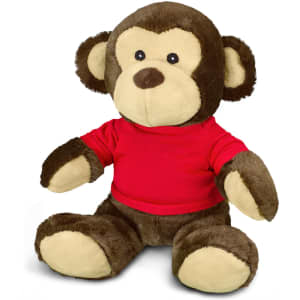 A plush monkey toy featuring brown and cream fur, dressed in a red shirt, with a friendly expression.