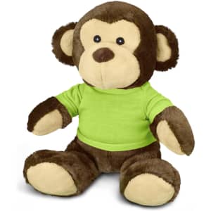 A brown monkey plush toy wearing a green shirt, featuring a friendly face and soft, cuddly texture.