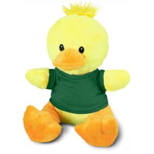 A yellow duck plush toy with an orange beak and feet, wearing a green shirt, has a fluffy tuft on its head.
