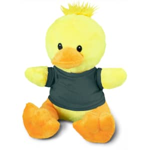 A yellow duck plush toy with an orange beak and feet, wearing a dark shirt, featuring a logo.