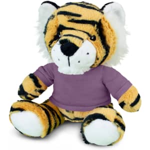 A cuddly tiger plush toy with orange and black stripes, dressed in a purple shirt, features a friendly expression.