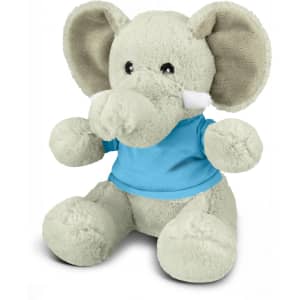 A grey elephant plush toy wearing a blue shirt, with large ears and a cute, friendly face.