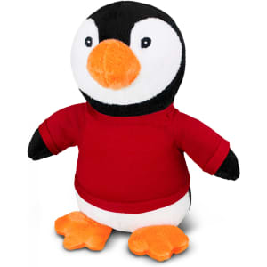 A plush penguin toy with a black and white body, orange beak and feet, wearing a red shirt. It has a logo on the shirt.