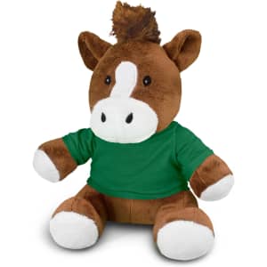 A brown horse plush toy with a white snout and hooves, wearing a green t-shirt. It has a small tuft of brown hair.