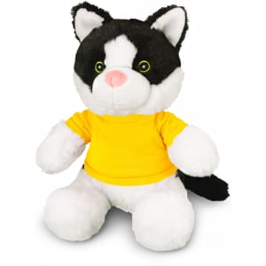 A black and white cat plush toy wearing a yellow shirt, featuring bright green eyes and soft fur.