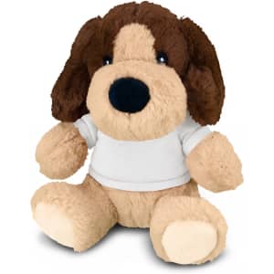 A plush dog toy featuring a brown and tan colour scheme, wearing a white shirt. It has a soft, cuddly design.