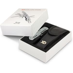 A multi-tool in a black pouch, presented in a white box. The tool has a silver finish and includes various functions.