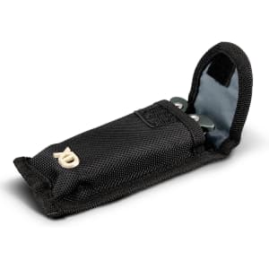 A black fabric case containing a multi-tool with silver accents, featuring a secure flap closure.