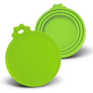 A set of three vibrant green silicone reusable can lids with a round shape and a circular handle on top.