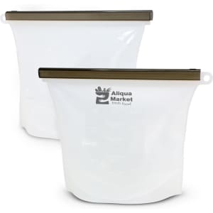 A silicone reusable storage pouch in white, featuring a brown seal and measurement markings, with a logo present.