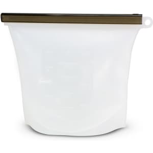 A white silicone reusable storage pouch with a bronze zip closure, featuring measurement markings.