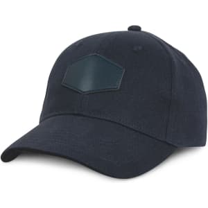 A dark navy cap featuring a textured patch on the front. The cap has a classic curved brim and adjustable strap.