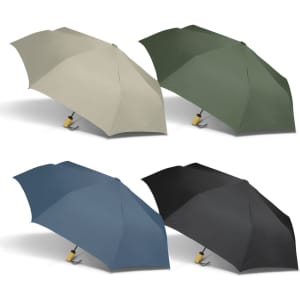A compact umbrella available in beige, green, blue, and black, featuring a small branding logo.