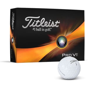 A white Titleist Pro V1 golf ball beside a black and orange box with a logo.