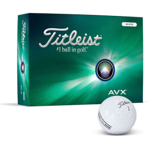 A white golf ball with a branding logo next to a box of Titleist AVX golf balls featuring a green and blue design.